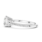 Round Diamond Ring with Trillion Side Stones