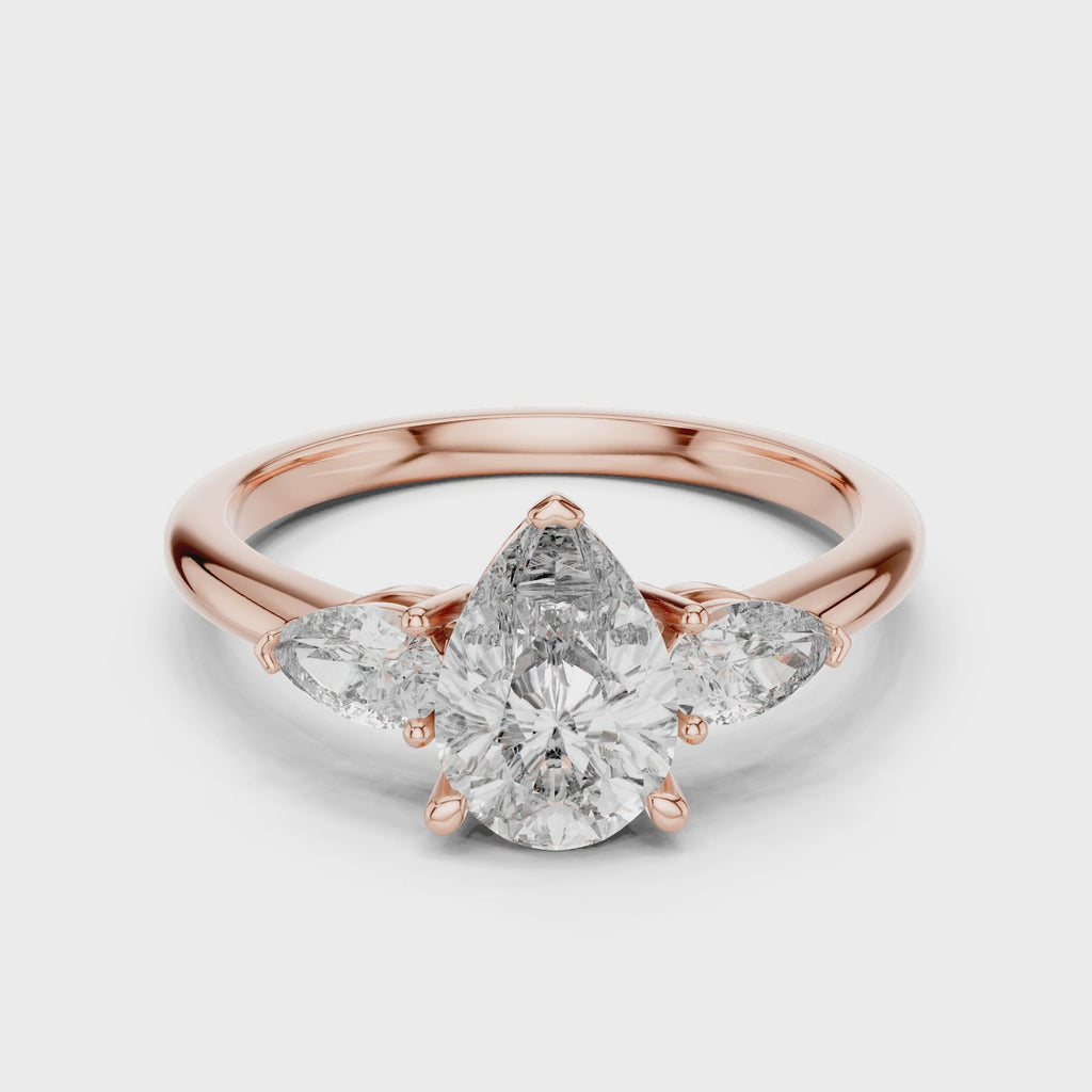 Pear Cut Three Stone Diamond Ring