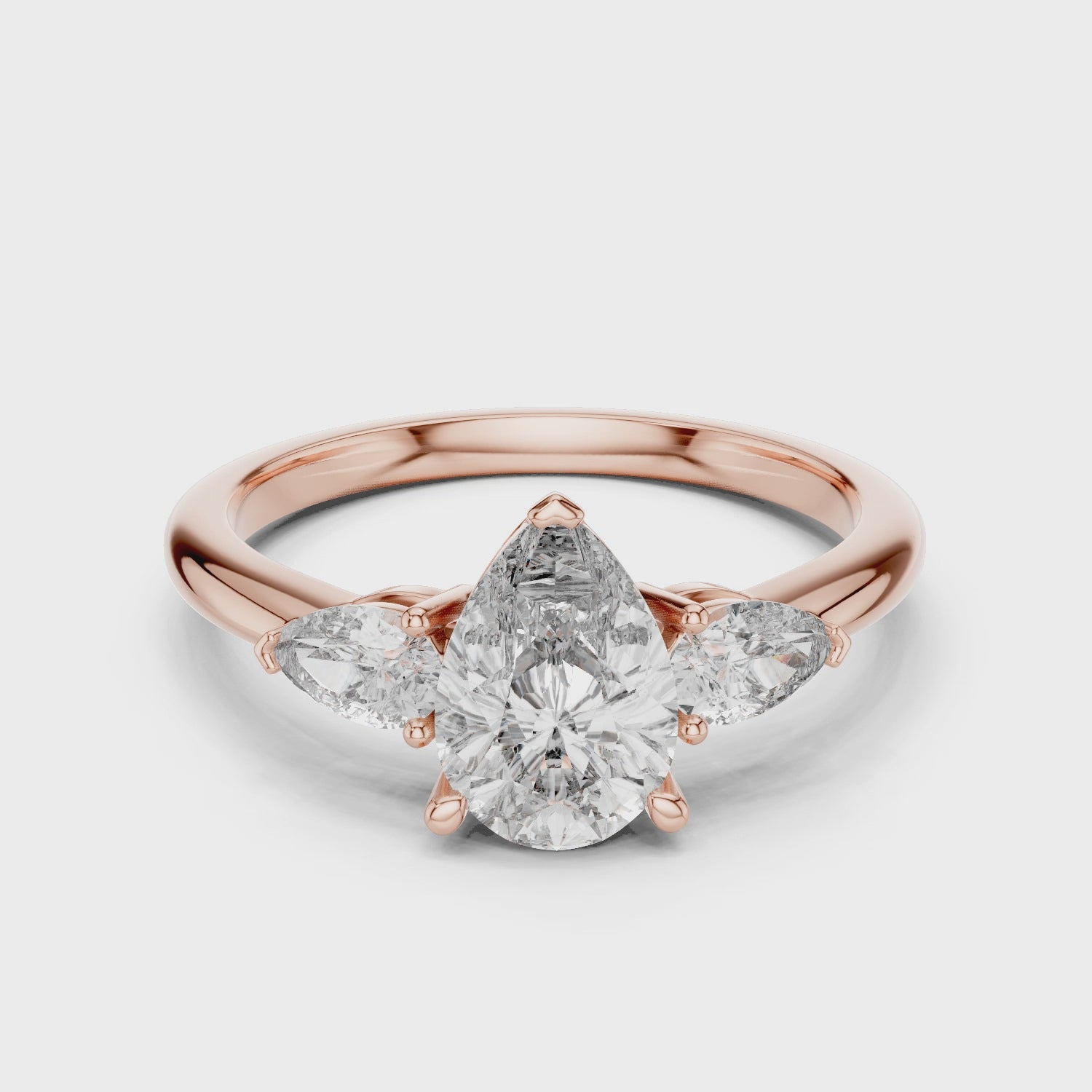 Pear Cut Three Stone Diamond Ring