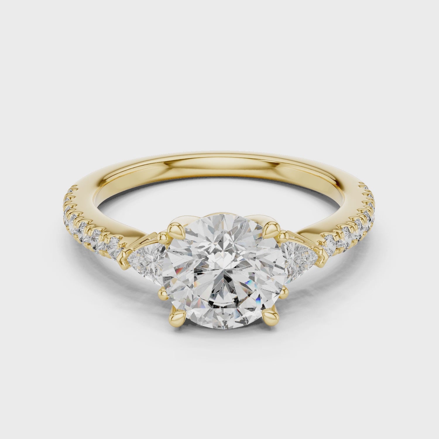 Round Diamond Ring with Trillion Side Stones