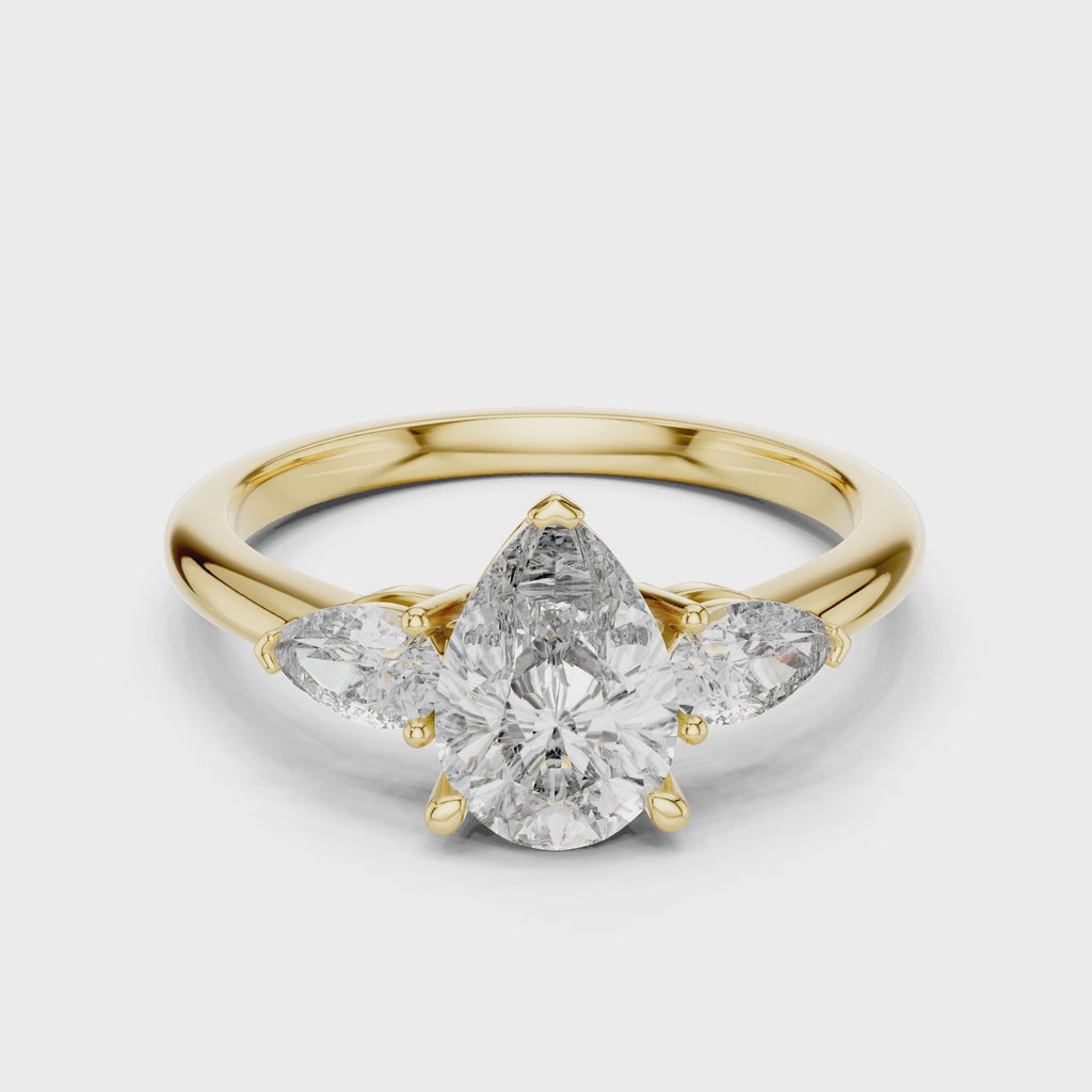 Pear Cut Three Stone Diamond Ring