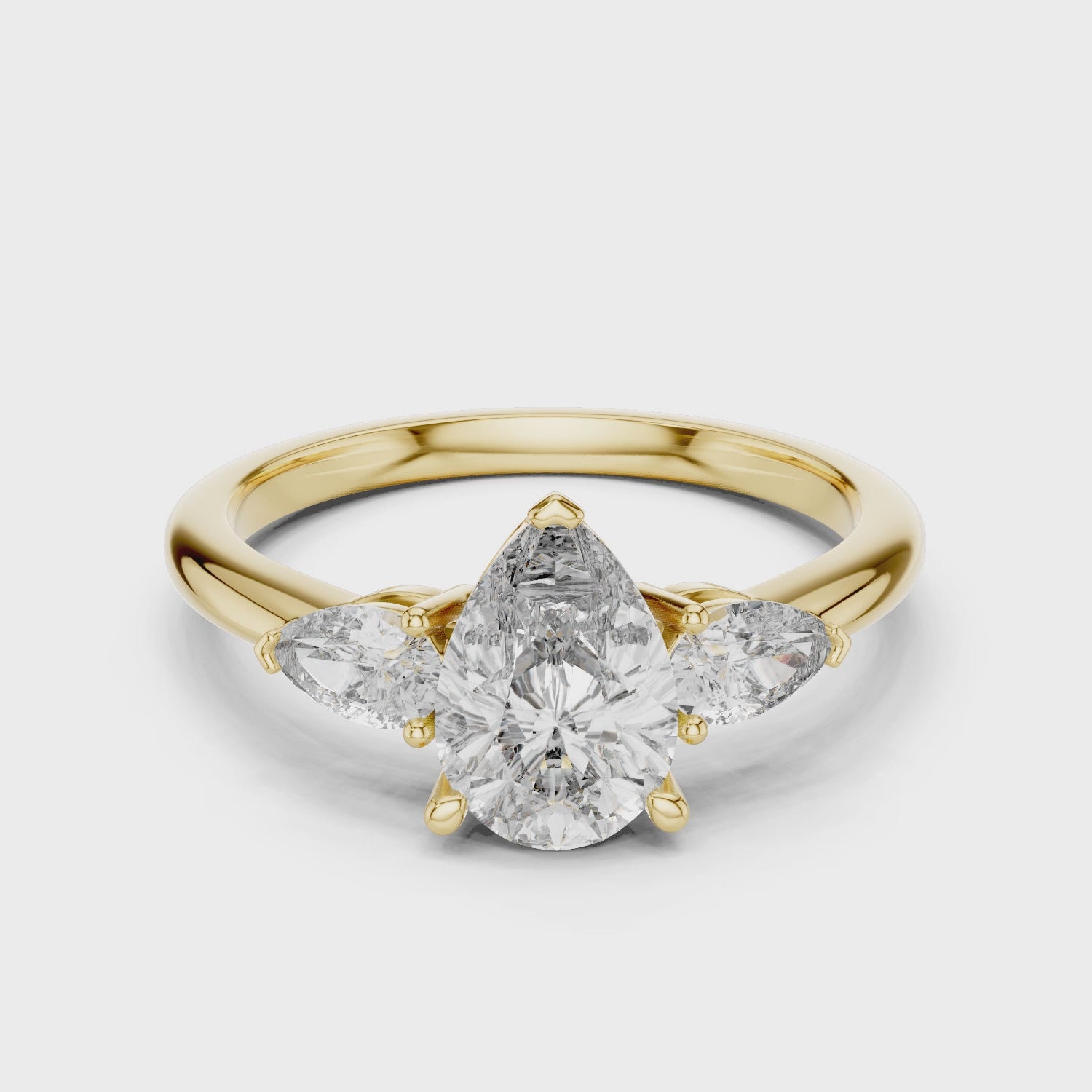 Pear Cut Three Stone Diamond Ring