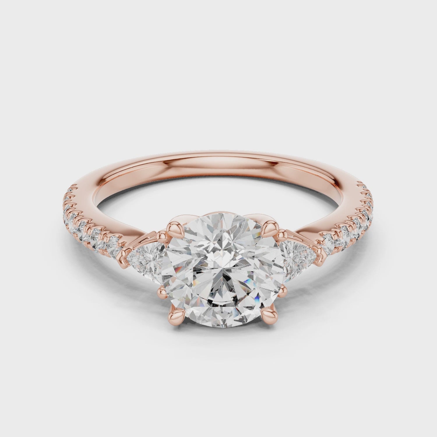 Round Diamond Ring with Trillion Side Stones
