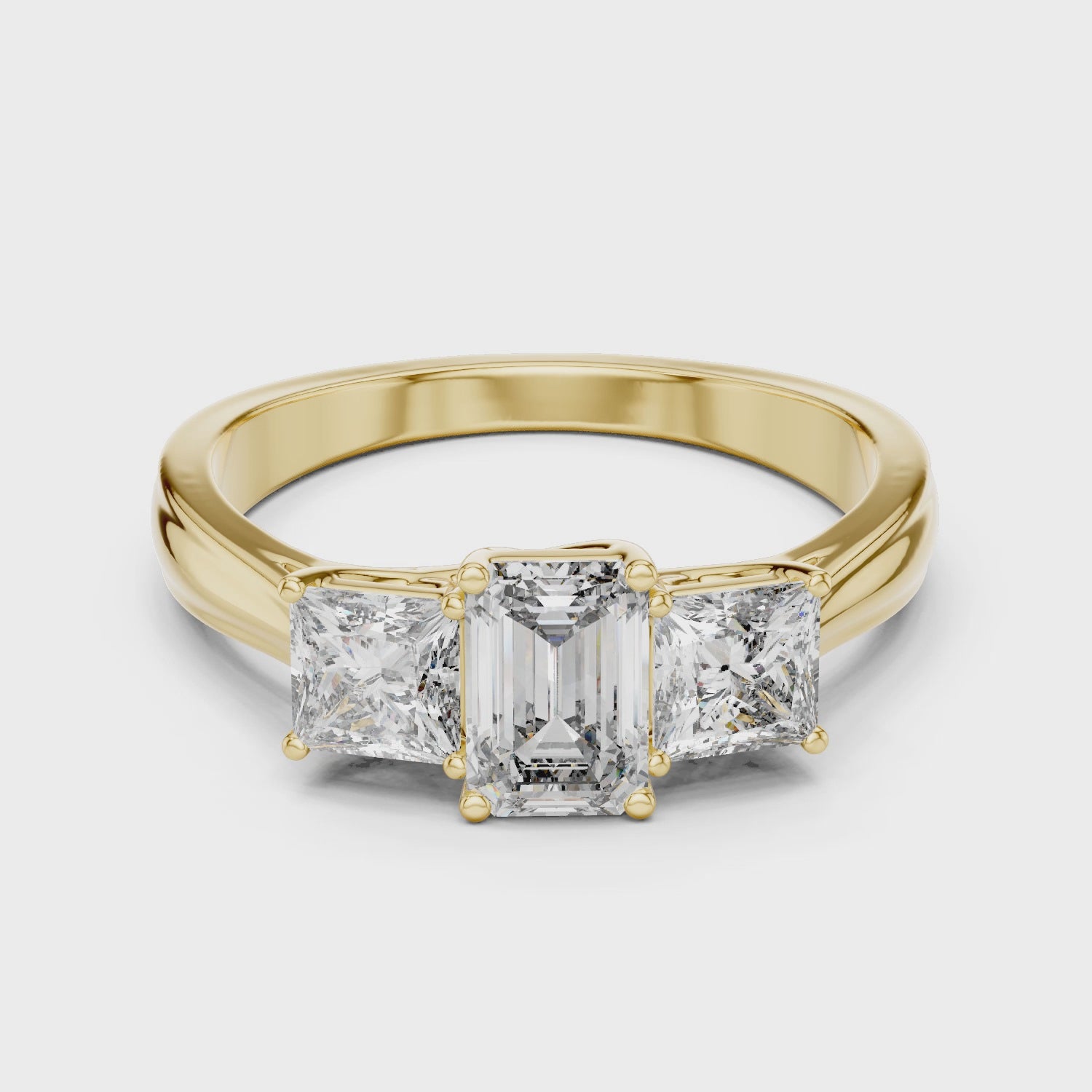 Emerald & Princess Cut Three Stone Diamond Ring