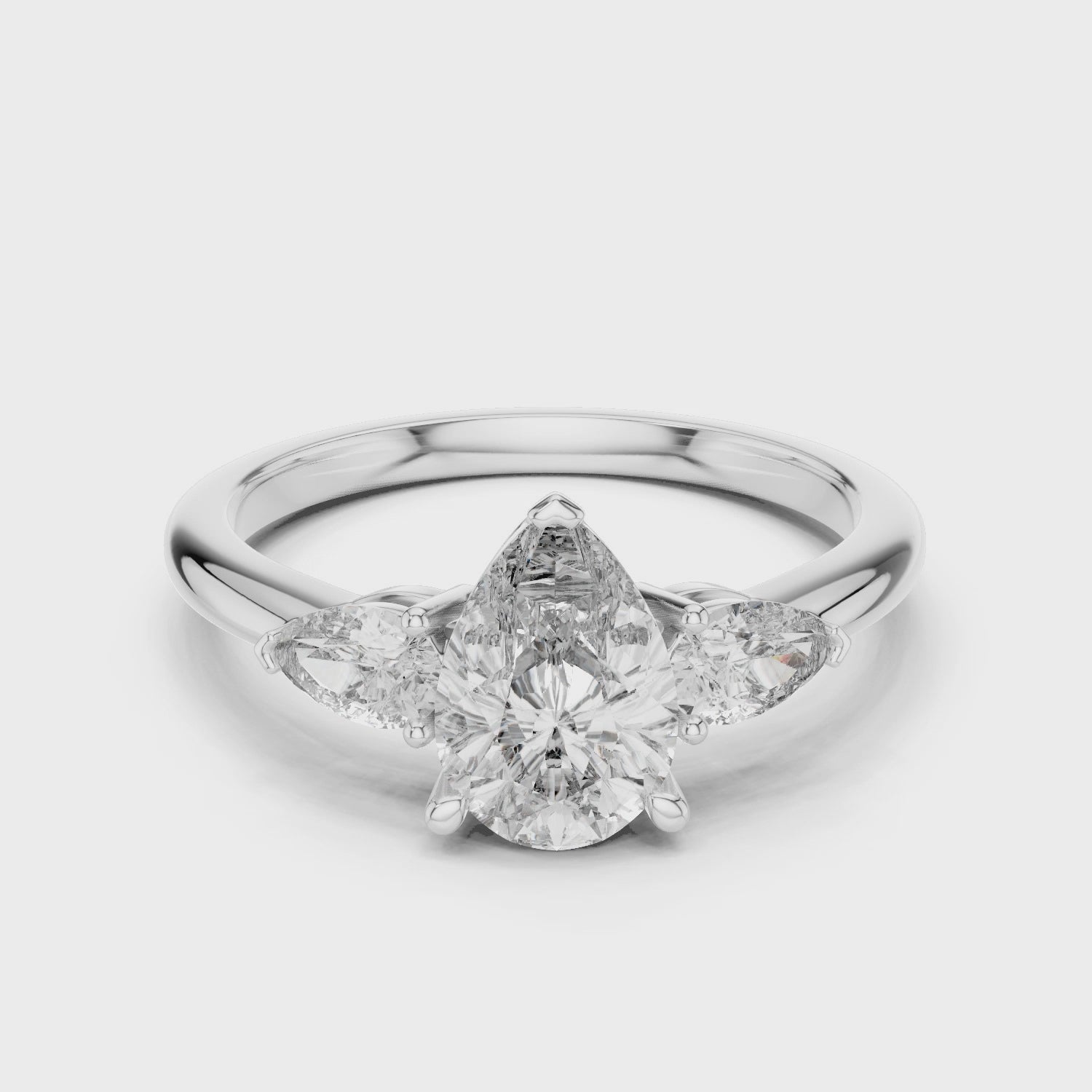 Pear Cut Three Stone Diamond Ring